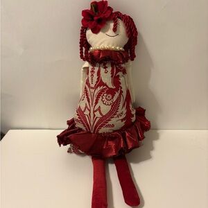 Festive Red Holiday Doll with Floral Accent